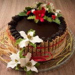 Christmas Theme Dark Chocolate Cake Surrounded by Wafer Rolls