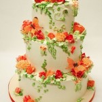 Tangerine Orange and Green Wedding Cake with Orange Butterflies Accents