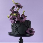 Dramatic Black Cake and Purple Flowers