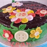 Birthday Cake with Buttons formed into Flowers by Claire and Sean Tillett