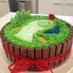 Golf cake bordered with kit kats