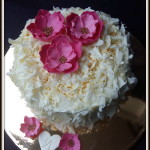 Cake Decorated with White Cholate and Fondant Flowers